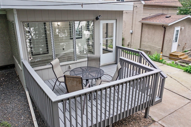 242 Winona St W, West Saint Paul, MN 55118 - wooden deck featuring outdoor dining area