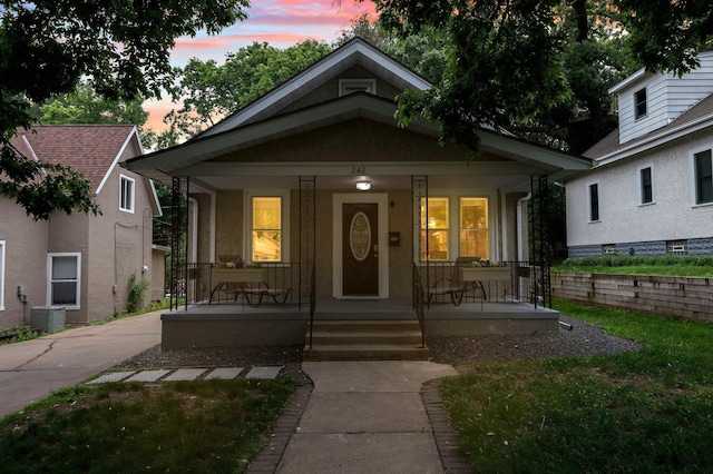 242 Winona St W, West Saint Paul, MN 55118 - view of front of property featuring covered porch