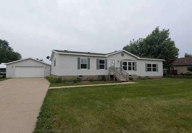 204 6th St W, Carlos, MN 56319 - manufactured / mobile home with crawl space, a garage, an outbuilding, and a front lawn