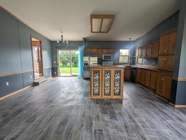 204 6th St W, Carlos, MN 56319 - kitchen with appliances with stainless steel finishes, plenty of natural light, dark wood-style floors, a chandelier, and ornamental molding