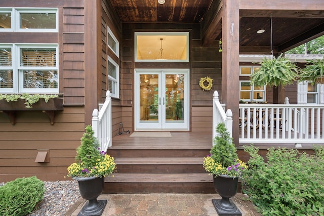 6300 78th Ln, Greenfield, MN 55357 - doorway to property with french doors and a porch