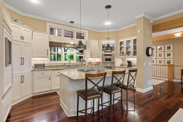 6300 78th Ln, Greenfield, MN 55357 - kitchen with double oven, tasteful backsplash, white cabinetry, and crown molding