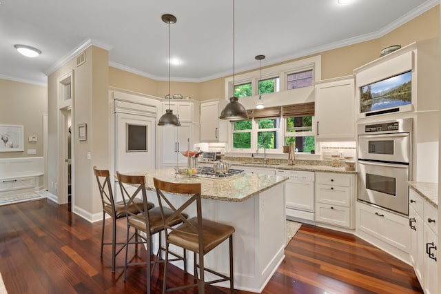 6300 78th Ln, Greenfield, MN 55357 - kitchen with stainless steel appliances, dark wood finished floors, white cabinetry, and crown molding