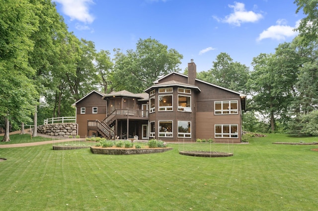 6300 78th Ln, Greenfield, MN 55357 - rear view of property with stairway, a chimney, a wooden deck, and a yard