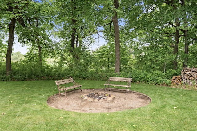6300 78th Ln, Greenfield, MN 55357 - view of green lawn featuring an outdoor fire pit