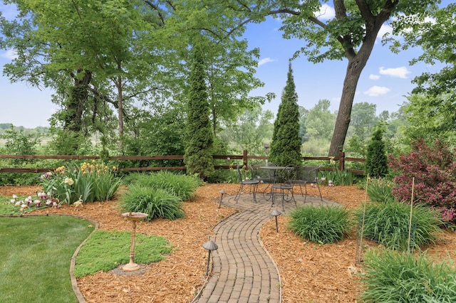 6300 78th Ln, Greenfield, MN 55357 - view of yard featuring view of wooded area and a patio