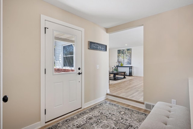 6676 Jason Ave NE, Monticello, MN 55362 - entryway featuring light wood-style floors and baseboards