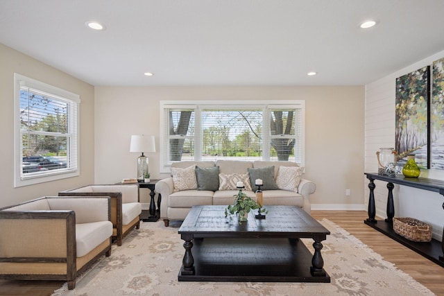 6676 Jason Ave NE, Monticello, MN 55362 - living area with healthy amount of natural light, light wood finished floors, and recessed lighting