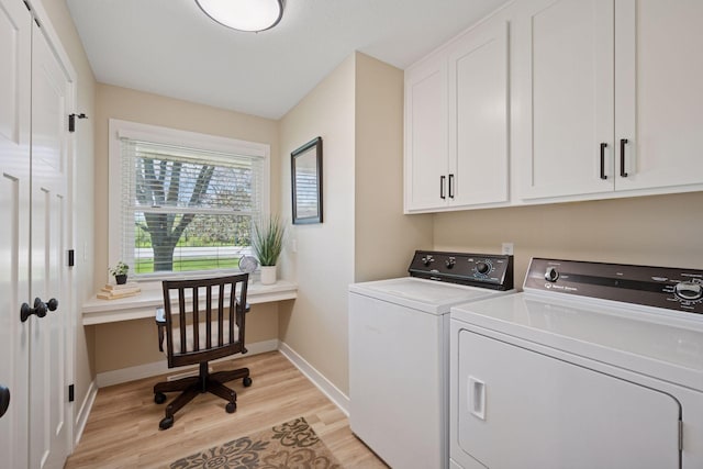 6676 Jason Ave NE, Monticello, MN 55362 - laundry room with independent washer and dryer, light wood-style flooring, cabinet space, and a desk