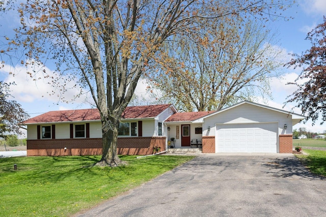 6676 Jason Ave NE, Monticello, MN 55362 - single story home with brick siding, driveway, a garage, and a front lawn