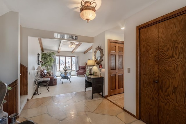 20206 Monks Ave, Mankato, MN 56001 - foyer with beamed ceiling, ceiling fan, and light stone finish flooring