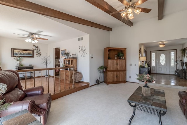 20206 Monks Ave, Mankato, MN 56001 - living room with a ceiling fan, beam ceiling, and light carpet