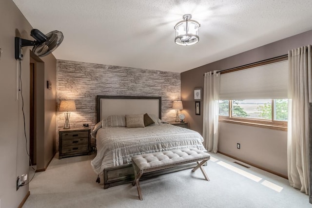 20206 Monks Ave, Mankato, MN 56001 - bedroom with light carpet and a textured ceiling