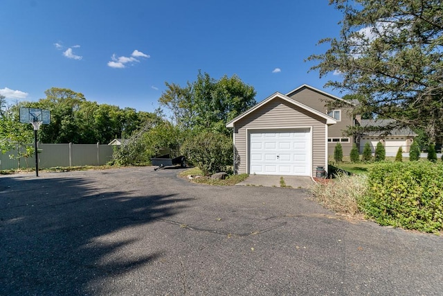 20206 Monks Ave, Mankato, MN 56001 - garage featuring asphalt driveway