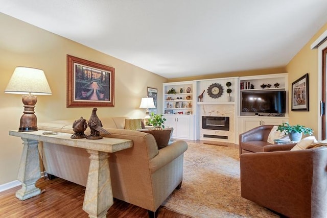 35 Nathan Ln N Unit 104, Plymouth, MN 55441 - living room with wood finished floors and a high end fireplace