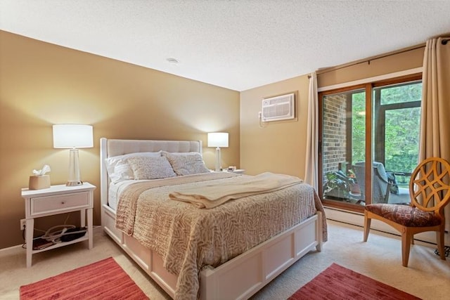 35 Nathan Ln N Unit 104, Plymouth, MN 55441 - bedroom featuring light colored carpet, access to exterior, a wall mounted AC, and a textured ceiling