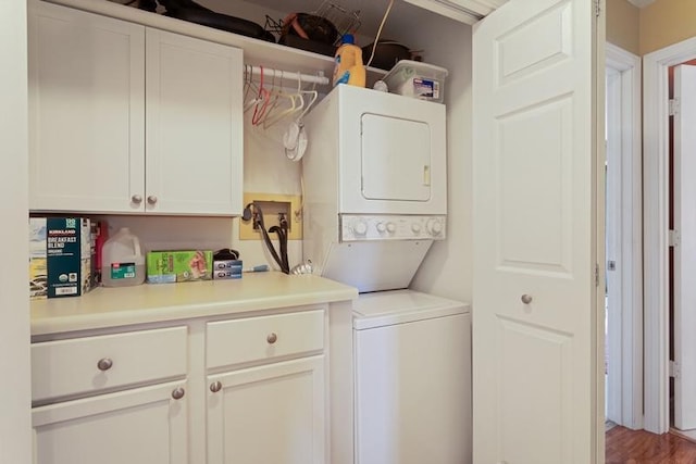 35 Nathan Ln N Unit 104, Plymouth, MN 55441 - laundry area featuring stacked washer / drying machine