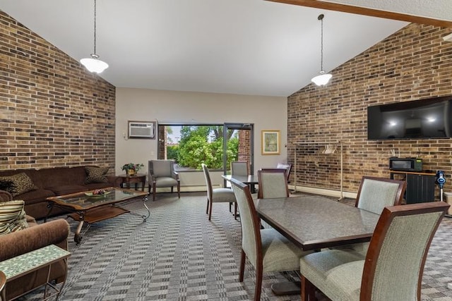 35 Nathan Ln N Unit 104, Plymouth, MN 55441 - dining area featuring brick wall, high vaulted ceiling, a wall mounted air conditioner, and carpet floors