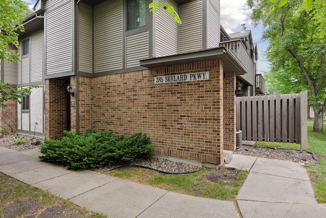 385 Shelard Pkwy Unit 103, Saint Louis Park, MN 55426 - view of side of home with brick siding