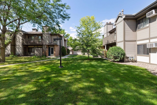 385 Shelard Pkwy Unit 103, Saint Louis Park, MN 55426 - view of home's community featuring a lawn