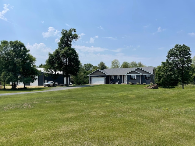 26780 Packard St NE, Athens Twp, MN 55040 - view of front of home featuring asphalt driveway, an attached garage, and a front yard