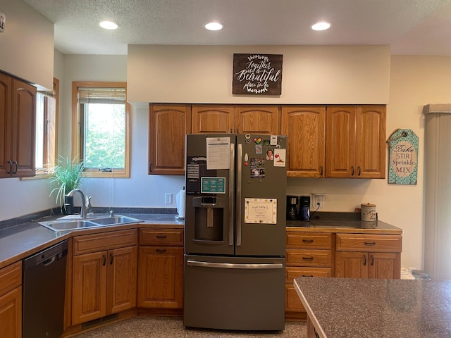 26780 Packard St NE, Athens Twp, MN 55040 - kitchen with stainless steel appliances, brown cabinetry, dark countertops, recessed lighting, and a textured ceiling