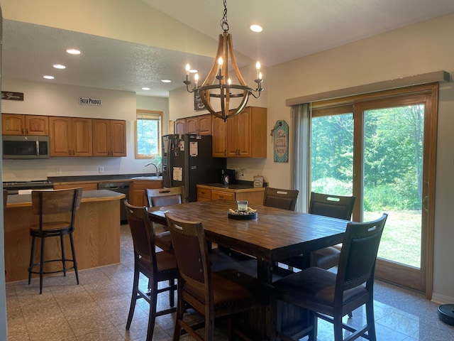 26780 Packard St NE, Athens Twp, MN 55040 - dining space featuring a chandelier, vaulted ceiling, and recessed lighting