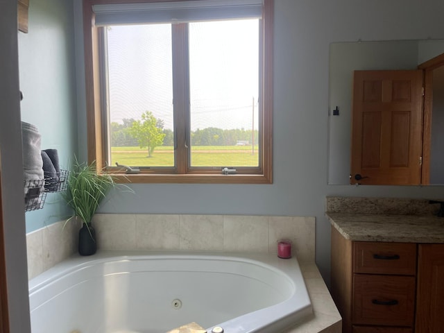 26780 Packard St NE, Athens Twp, MN 55040 - full bath featuring plenty of natural light, a whirlpool tub, and vanity