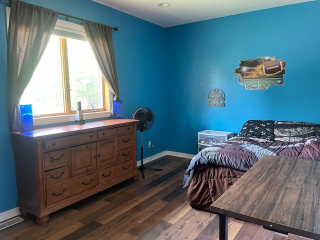 26780 Packard St NE, Athens Twp, MN 55040 - bedroom with baseboards and dark wood finished floors