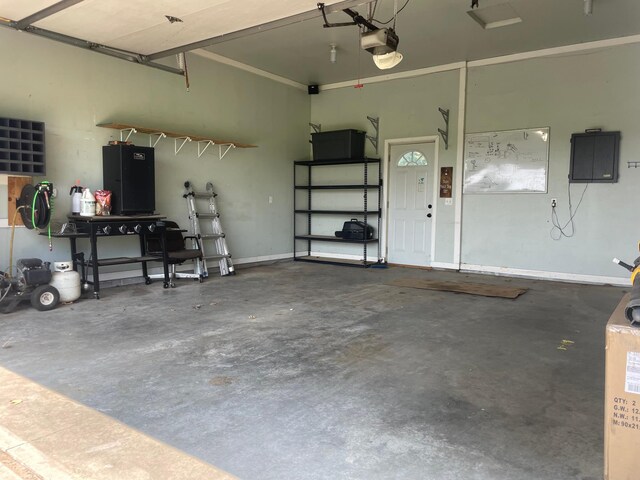 26780 Packard St NE, Athens Twp, MN 55040 - garage featuring electric panel and a garage door opener