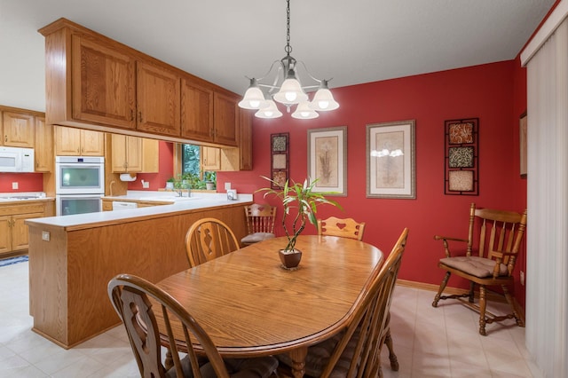 9855 Kadler Ave NE, Otsego, MN 55362 - dining room with a chandelier and light flooring