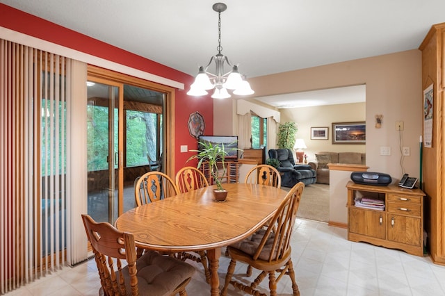 9855 Kadler Ave NE, Otsego, MN 55362 - dining room featuring a chandelier and light flooring