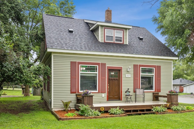 13805 Central Ave, Becker, MN 55308 - new england style home featuring a chimney, a front yard, and a shingled roof