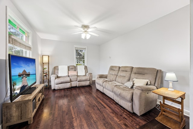 13805 Central Ave, Becker, MN 55308 - living area with dark wood-type flooring, healthy amount of natural light, and ceiling fan