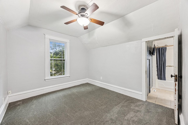 13805 Central Ave, Becker, MN 55308 - bonus room featuring carpet, vaulted ceiling, ceiling fan, and tile patterned flooring
