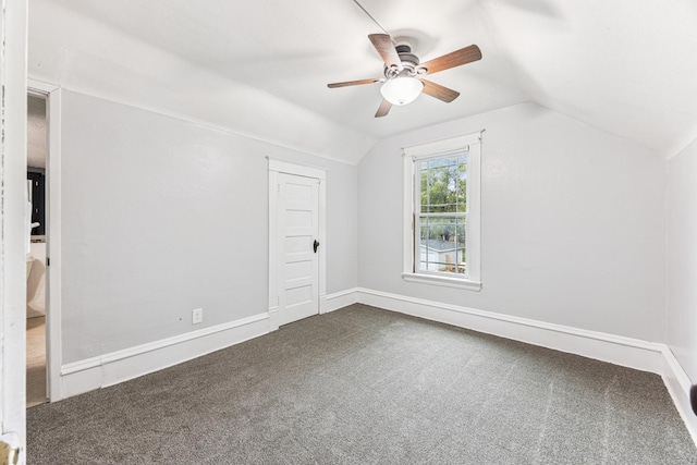 13805 Central Ave, Becker, MN 55308 - additional living space featuring dark carpet, lofted ceiling, and a ceiling fan