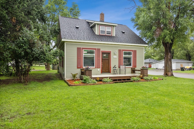 13805 Central Ave, Becker, MN 55308 - view of front of house with a shingled roof, a front yard, a chimney, and covered porch