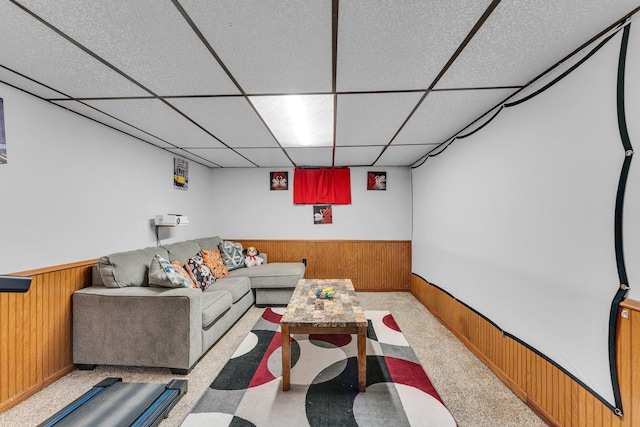 5215 Washburn Ave N, Minneapolis, MN 55430 - living area featuring wood walls, a paneled ceiling, and a wainscoted wall