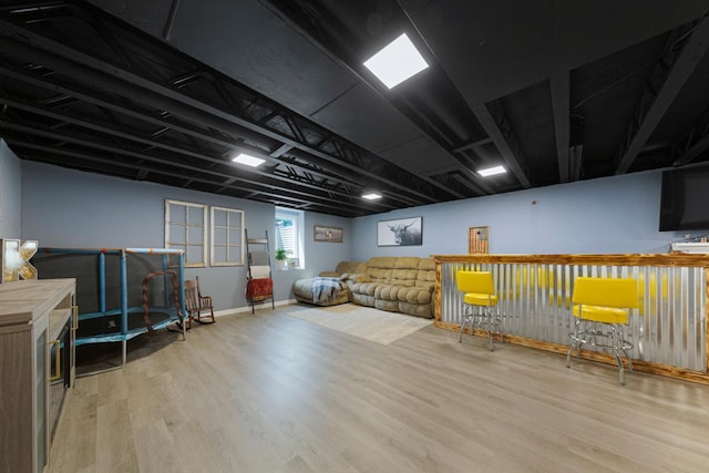 2585 3rd Ave NE, Owatonna, MN 55060 - basement with wood finished floors and baseboards