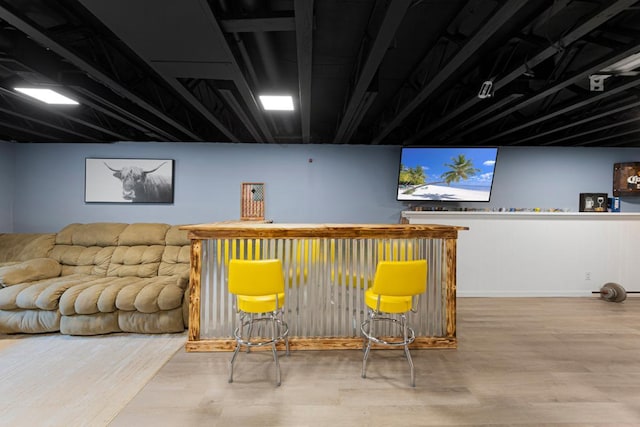 2585 3rd Ave NE, Owatonna, MN 55060 - indoor dry bar featuring wood finished floors