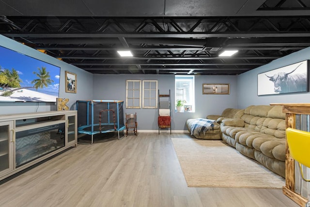 2585 3rd Ave NE, Owatonna, MN 55060 - living area with wood finished floors and baseboards