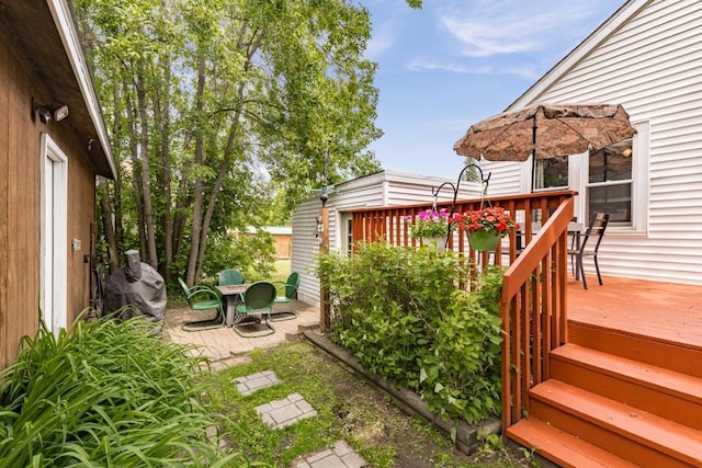 28 16th St, Cloquet, MN 55720 - view of yard with a wooden deck and a patio area