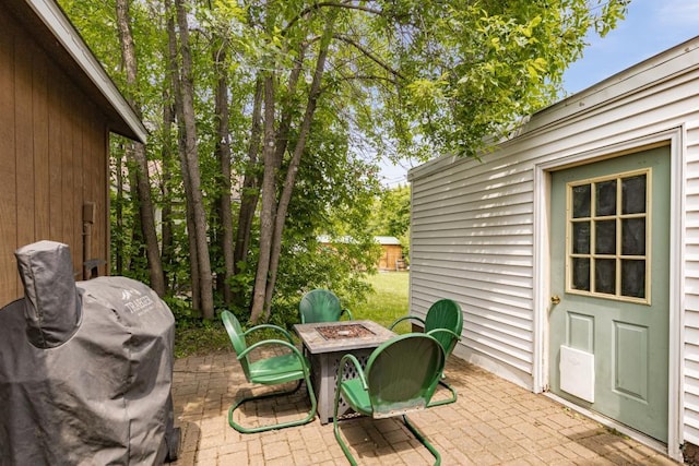 28 16th St, Cloquet, MN 55720 - view of patio with a fire pit and area for grilling