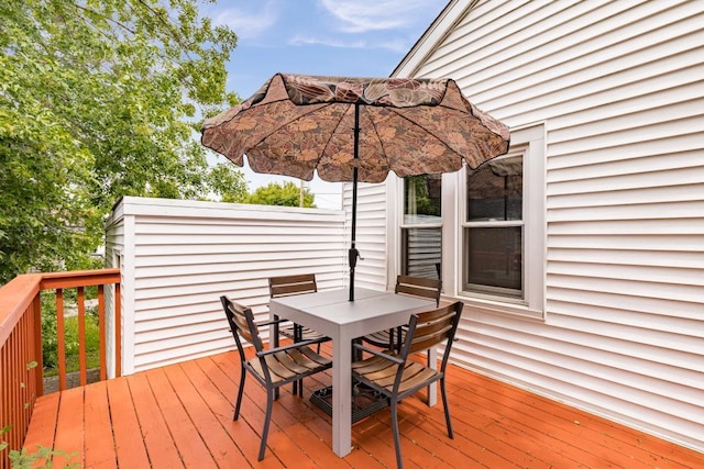 28 16th St, Cloquet, MN 55720 - wooden deck with outdoor dining area