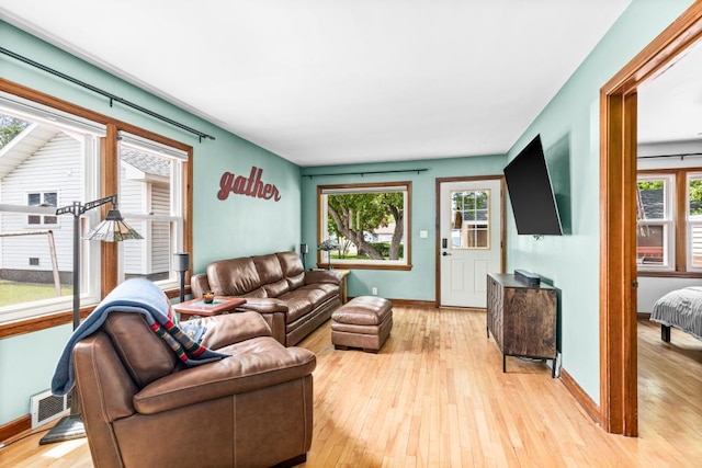 28 16th St, Cloquet, MN 55720 - living room featuring light wood-style flooring and baseboards