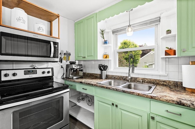 28 16th St, Cloquet, MN 55720 - kitchen featuring appliances with stainless steel finishes, open shelves, and green cabinets