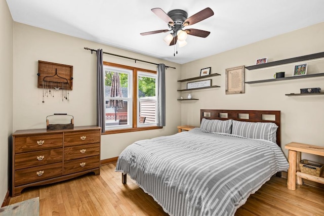 28 16th St, Cloquet, MN 55720 - bedroom with light wood-style floors and ceiling fan