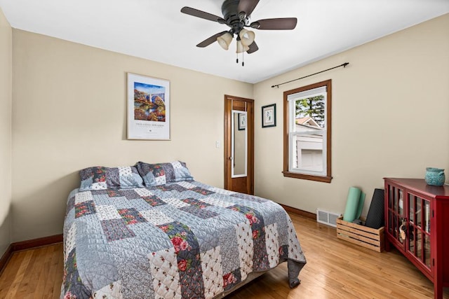 28 16th St, Cloquet, MN 55720 - bedroom featuring wood finished floors and ceiling fan