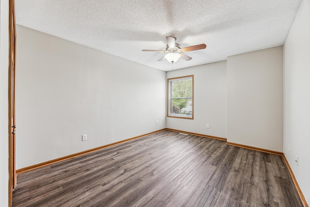 6773 Urbandale Ln N, Maple Grove, MN 55311 - unfurnished room with wood finished floors, ceiling fan, and a textured ceiling