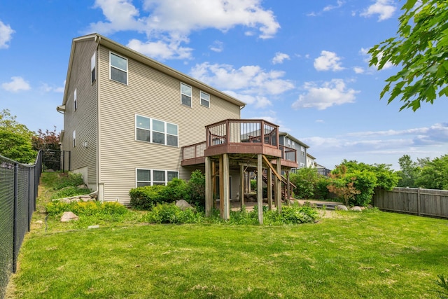 6773 Urbandale Ln N, Maple Grove, MN 55311 - rear view of property featuring a deck, a fenced backyard, and stairs